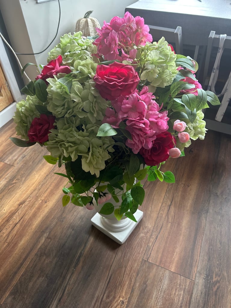 Artificial Flower Arrangement in stone pillar vase