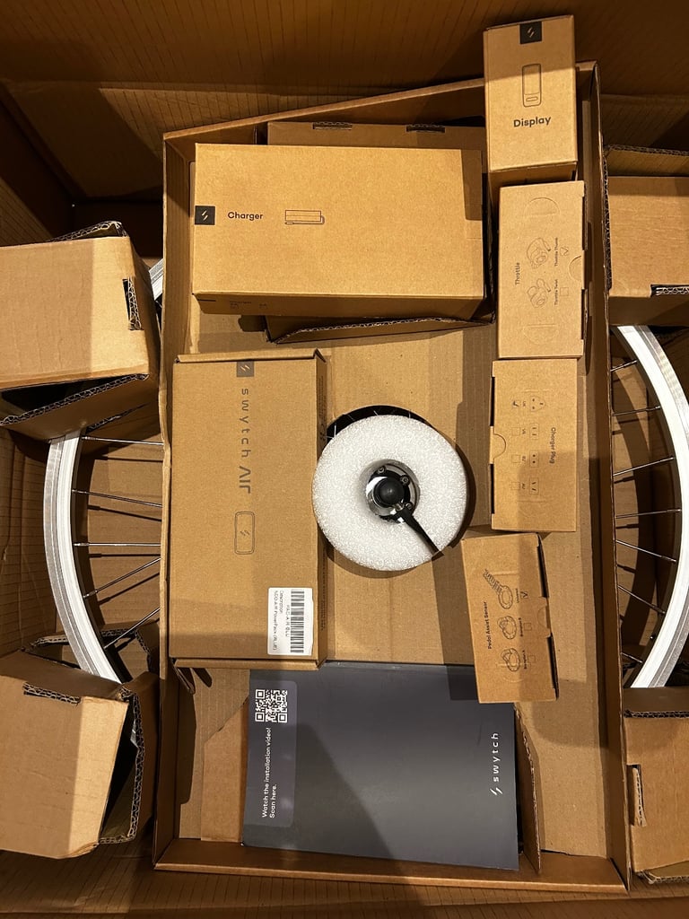 Brand new Swytch electric bike conversion kit with accessories