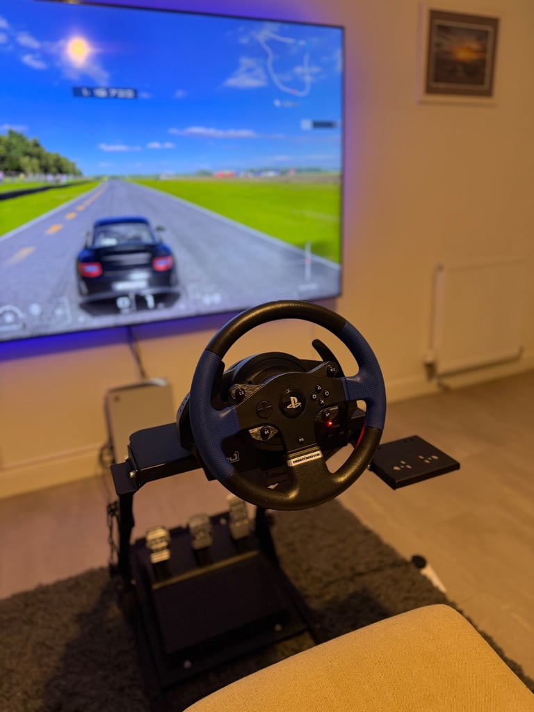 image for Thrustmaster T150 Pro Racing Wheel + 3‑Pedal Set with GT Omega Stand – Like New