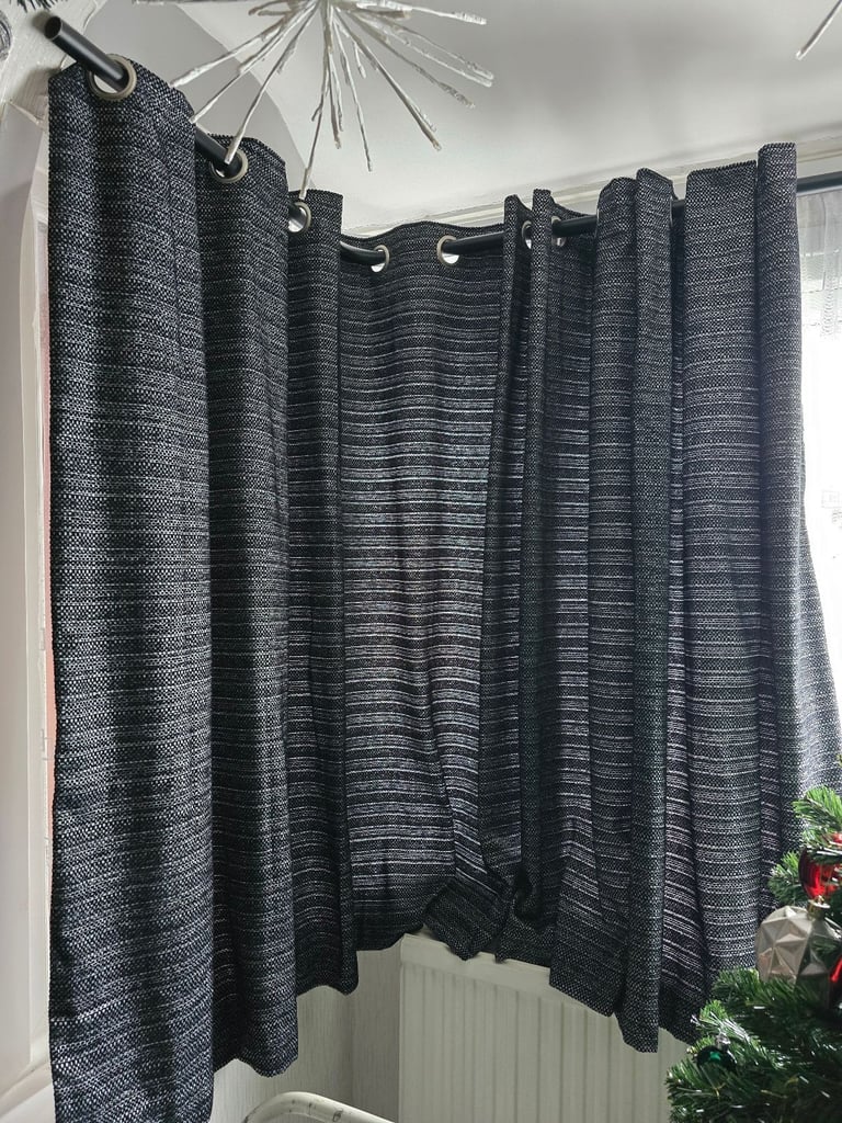 Halden Black Eyelet Lined Curtains