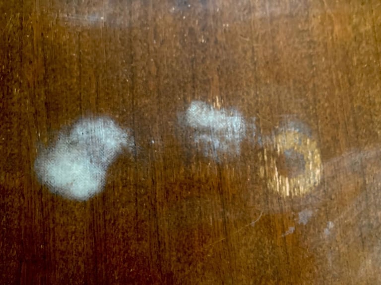 Dark mahogany finish dining table and six chairs