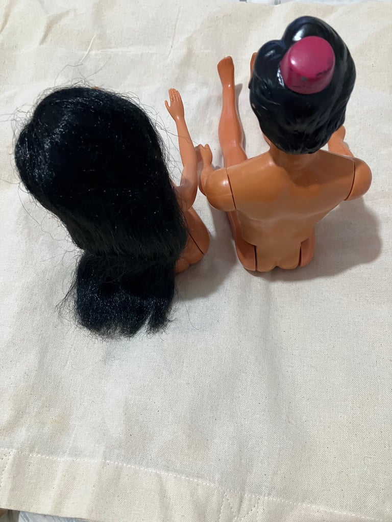 Free with any purchase over £10 -      12 DOLLS 