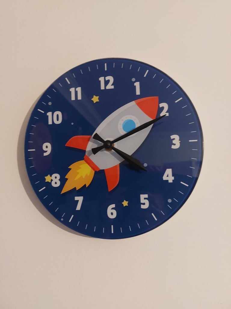 Space theme rocket wall clock
