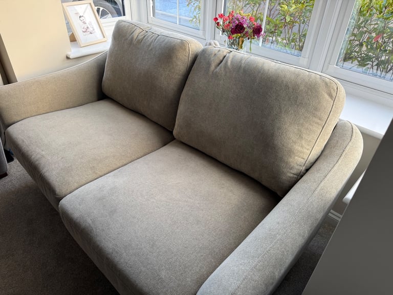 SNUG small green sofa. 