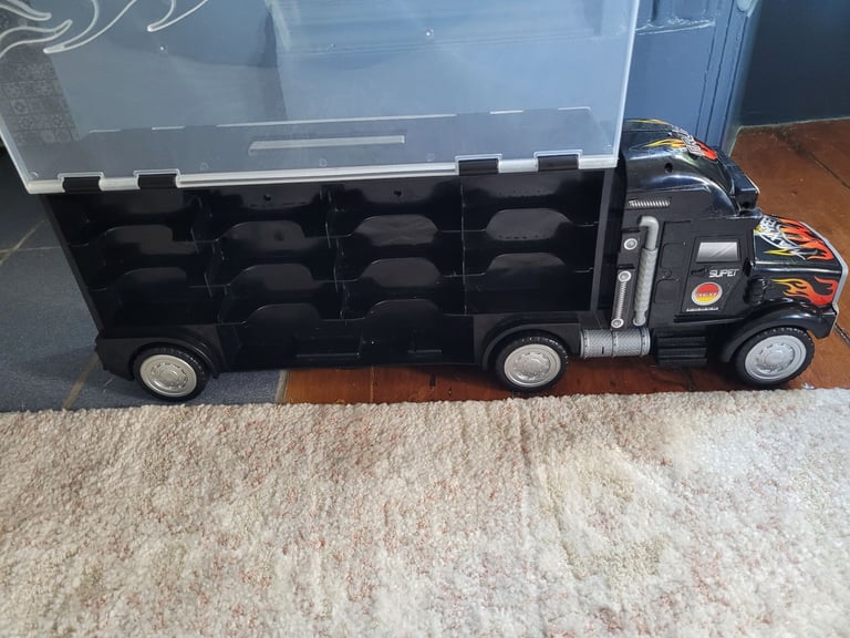 Black car transporter lorry