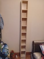 Ikea Billy unit, used for DVD's but can be adjusted to fit a variety of items.