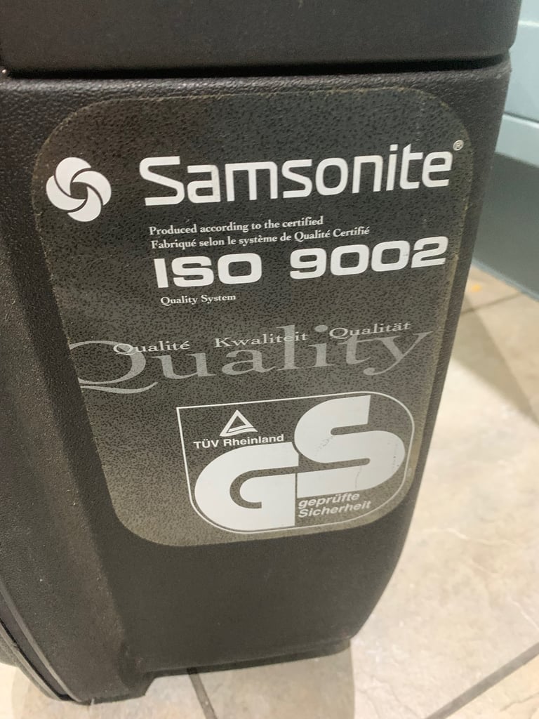 Samsonite very large hard shell suitcase, combination lock, pull handle and wheels