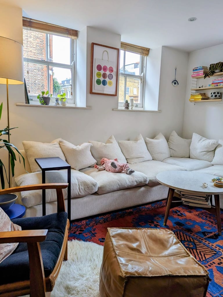 Massive white corner sofa (baby not included)