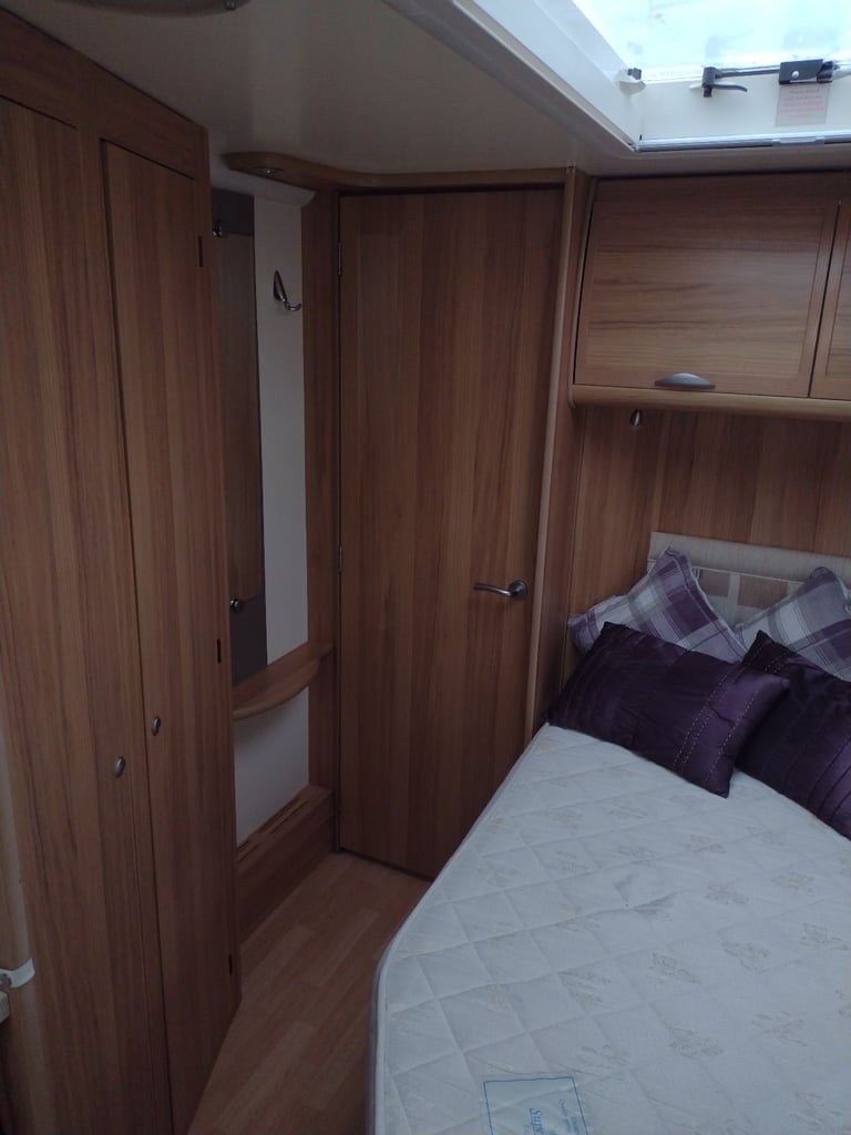 Bailey unicorn Valencia 2012 caravan fixed bed motor mover awning 