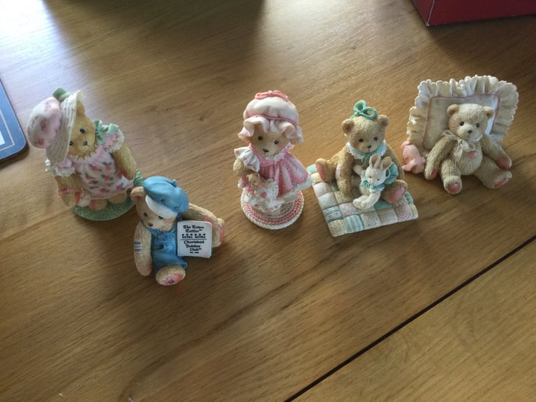 FIVE CHERISHED TEDDY ORNAMENTS.