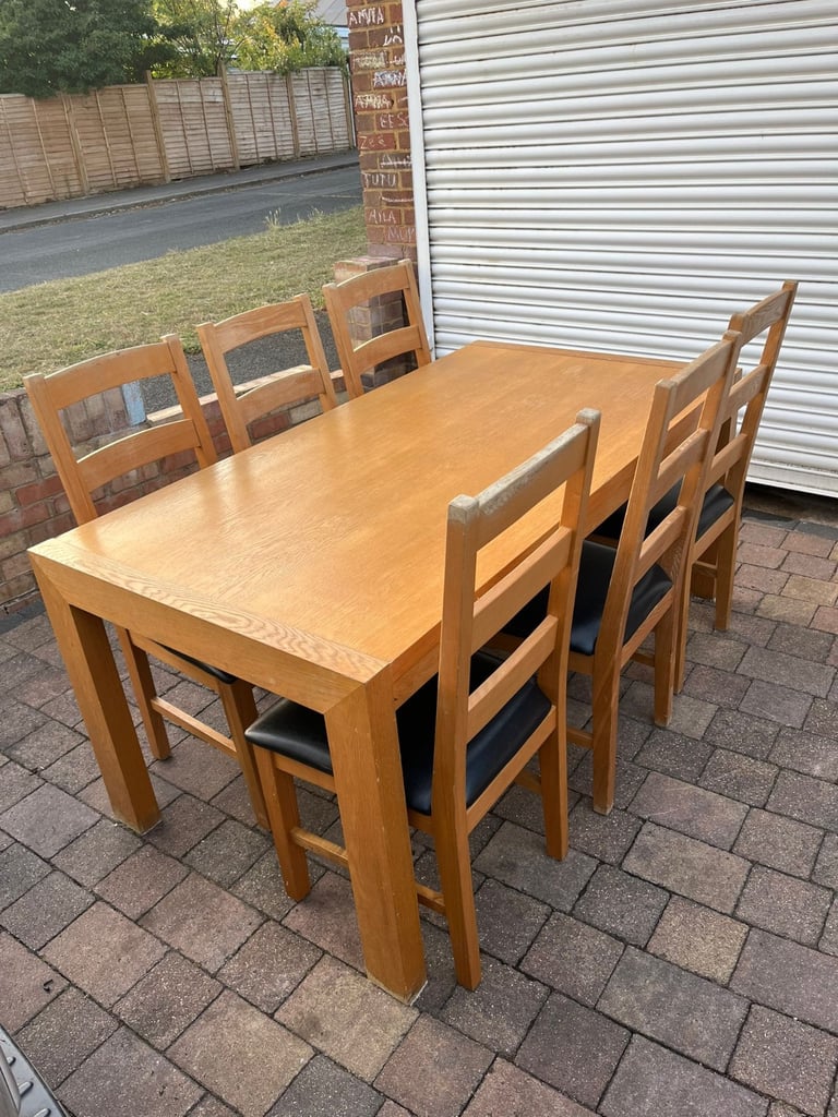 Large dining table with 6 chairs*delivery available 