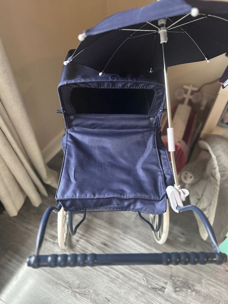 Navy dolls pram 