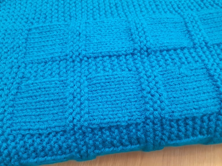 Hand knitted baby blanket 