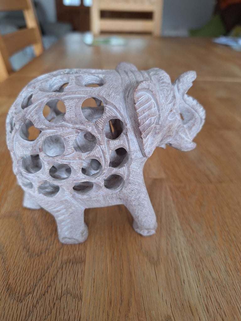 image for Stone elephant elephant carrying a baby elephant 