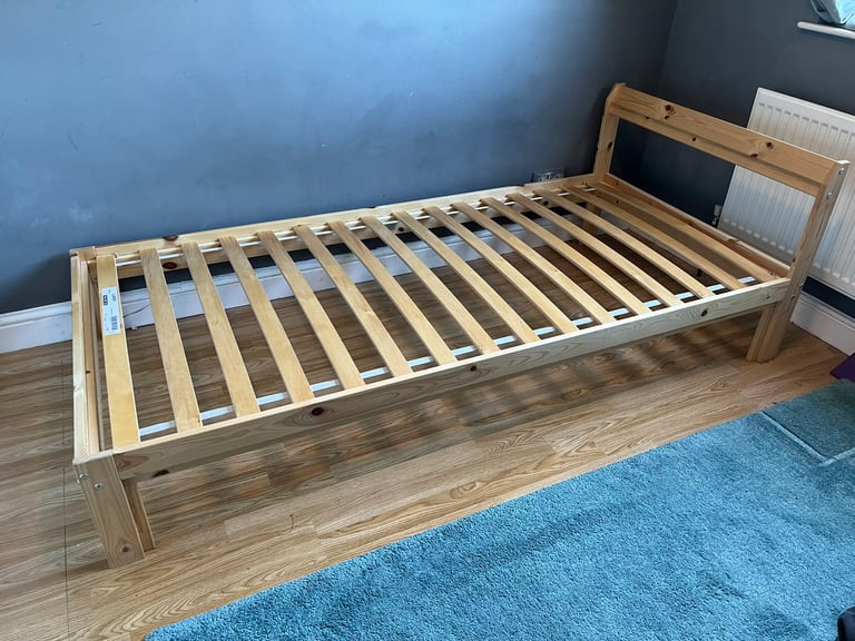 Wooden single bed