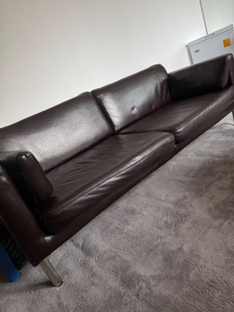 image for 2 Seater leather sofa and puffer table 