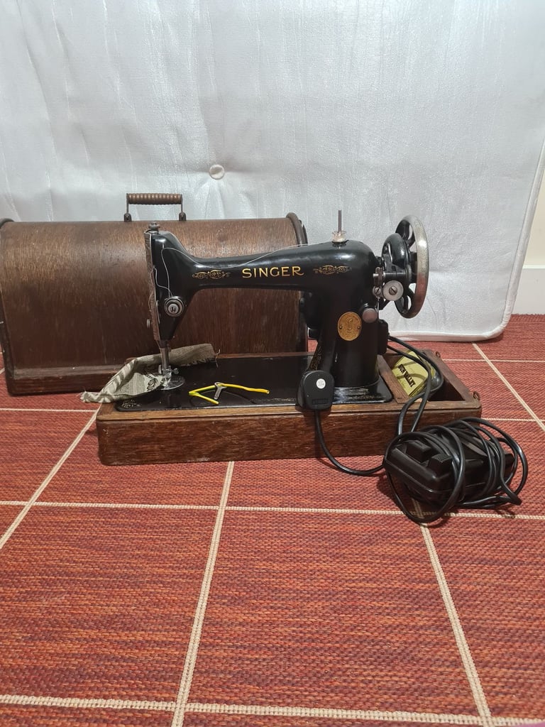 image for Singer electric sewing machine with storage box 