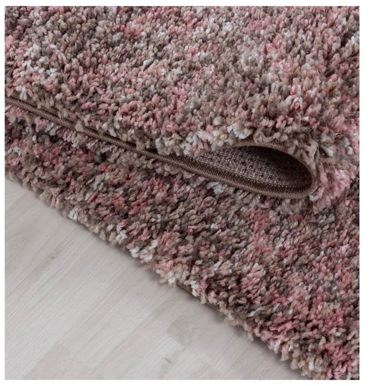 Brand new multicoloured rugs.  £30 each 