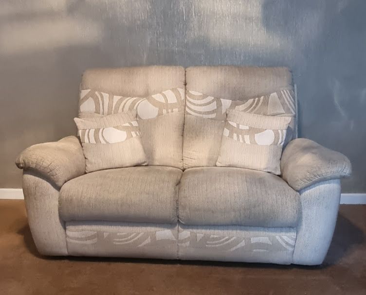 Cream sofa with matching armchair