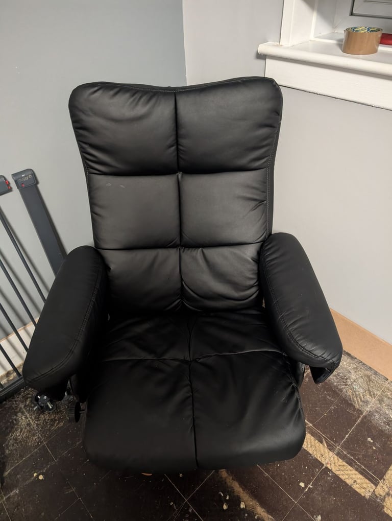 Black leather recliner chair with storage foot stool 