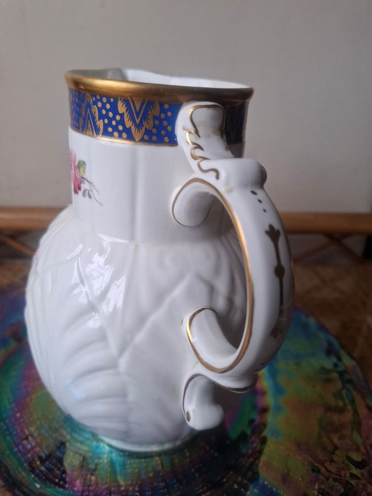 The Caughley (Coalport) Mask-Head Jug originally produced about 1770