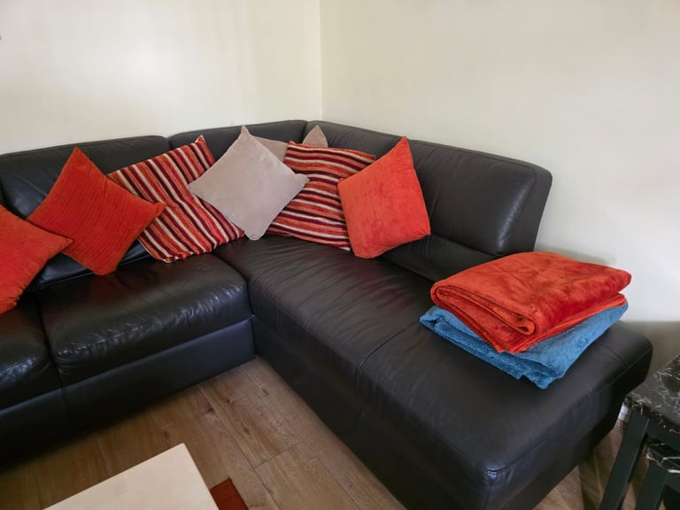 L shape brown leather corner settee 
