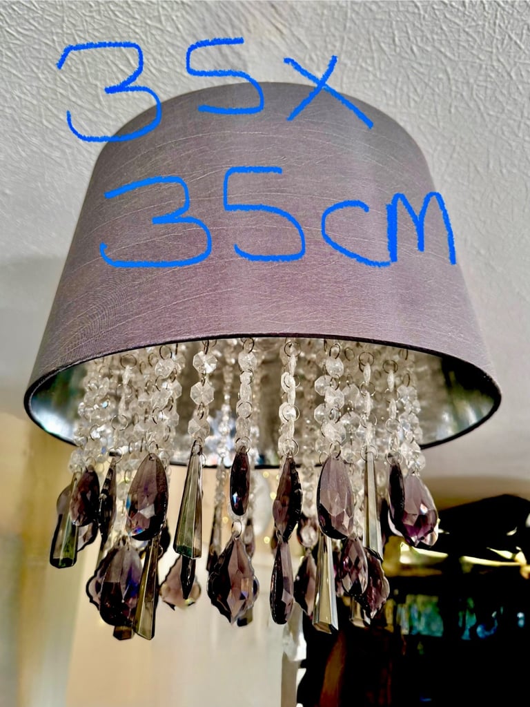 Grey pleated satin shade with drop cristals Measuring 35x 35 cm. Drop crystal plastic 