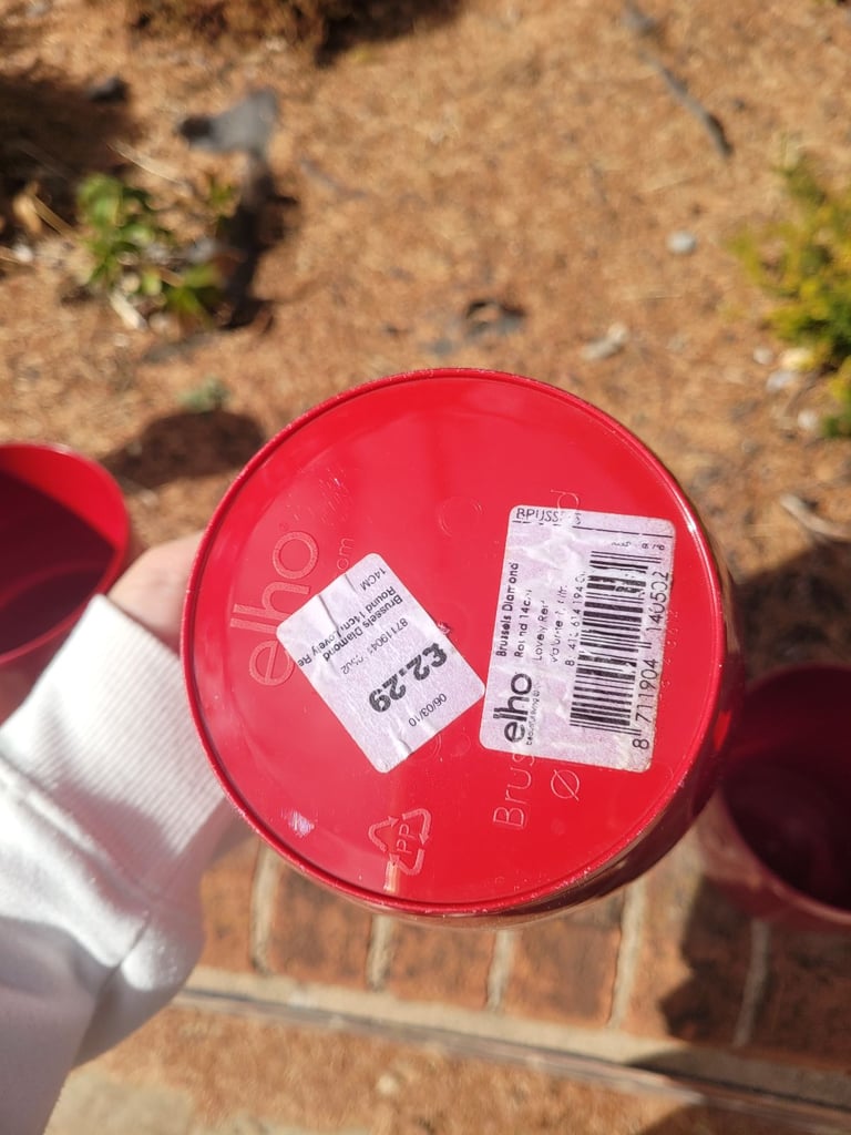 5 mid-sized red pots in good condition
