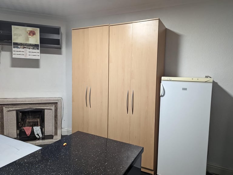 Room with separate kitchen. 