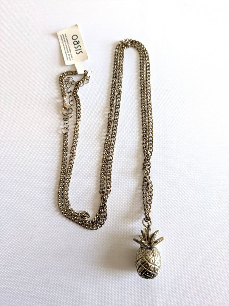image for Brand new Oasis gold style long pineapple necklace. £5