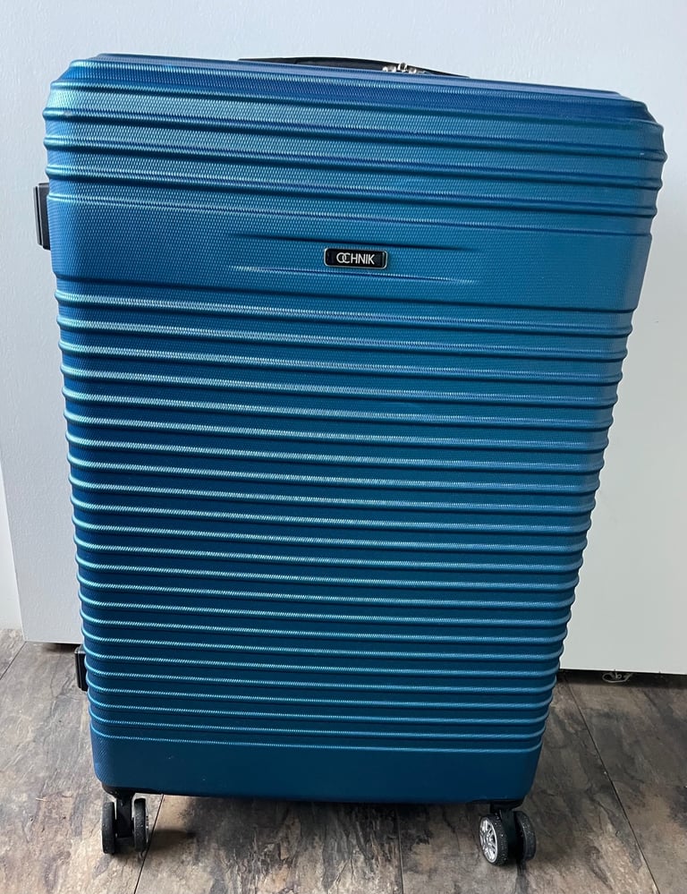 Large suitcase on wheels. Used just once on a return journey lightweight large 