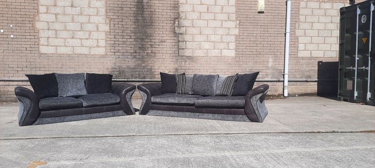 DFS 3&2 BLACK AN GRAY SOFAS 