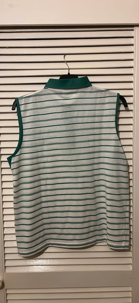 This is a sleeveless polo shirt by the Scottish brand Lyle & Scott