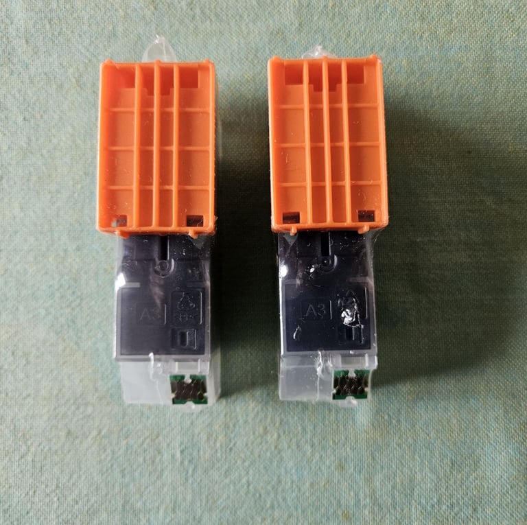 Two new black ink cartridges with Expression Premium numbers