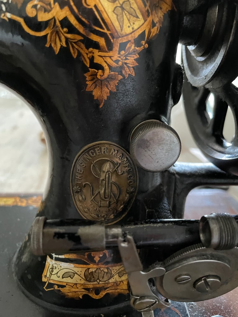 Vintage hand cranked singer sewing machine 