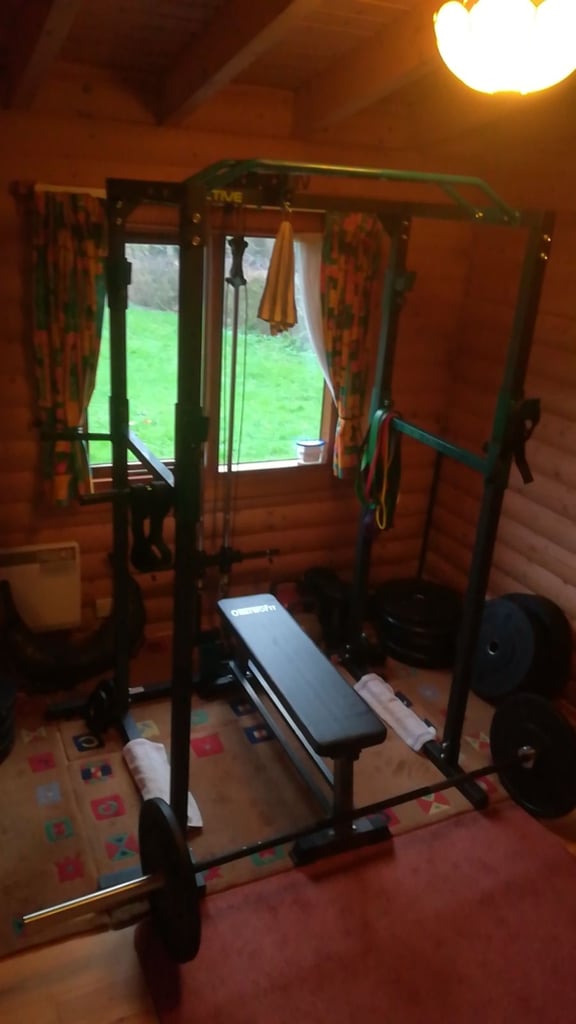 Power rack with pulley. Dips, Pull ups, Bench, squats, overhead press, pull down