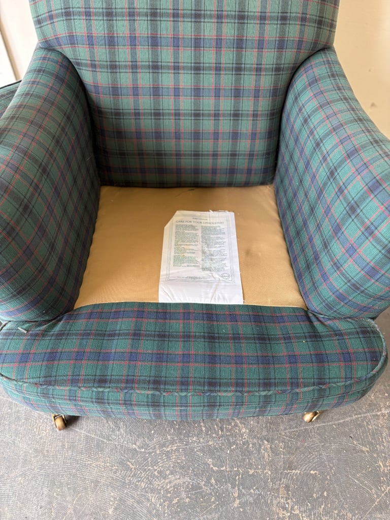 Marks and Spencer classic club chair with brass castors ! 