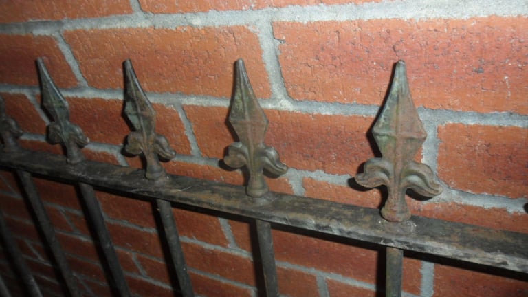 PAIR OF WROUGHT IRON GATES