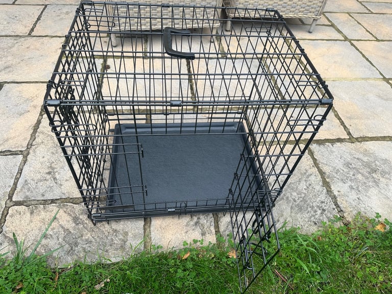 Lovely black dog crate for small/toy dog.