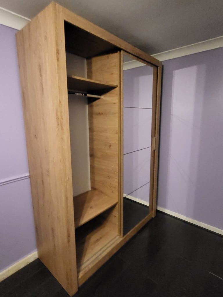 Large double wardrobe with mirror panel