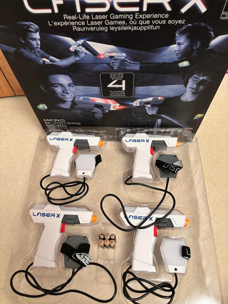 Laser X 4 Micro Blasters, 2 never used, excellent condition with box and batteries