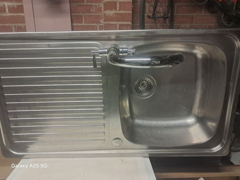 Kitchen sink and tap