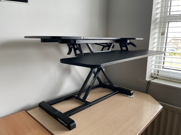 Height adjustable computer desk