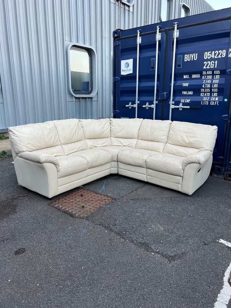Cream leather corner sofa with recliner 