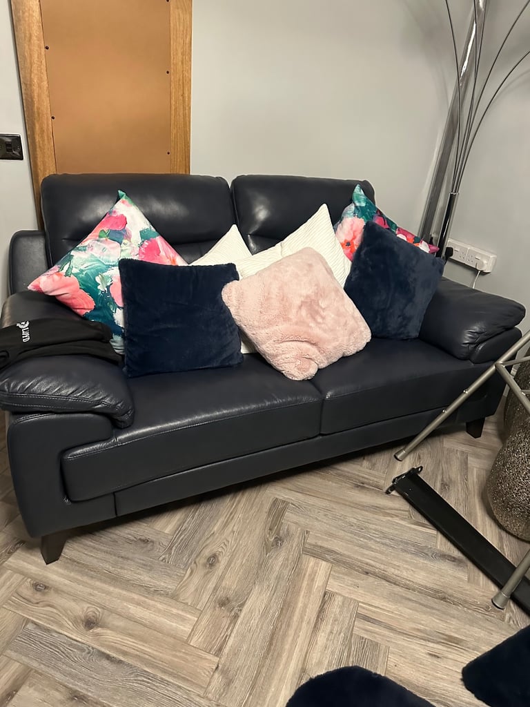 Two sofa,s ones a two seater the others a lazy boy sofa