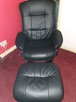 Two matching recliner chairs and foot rests 
