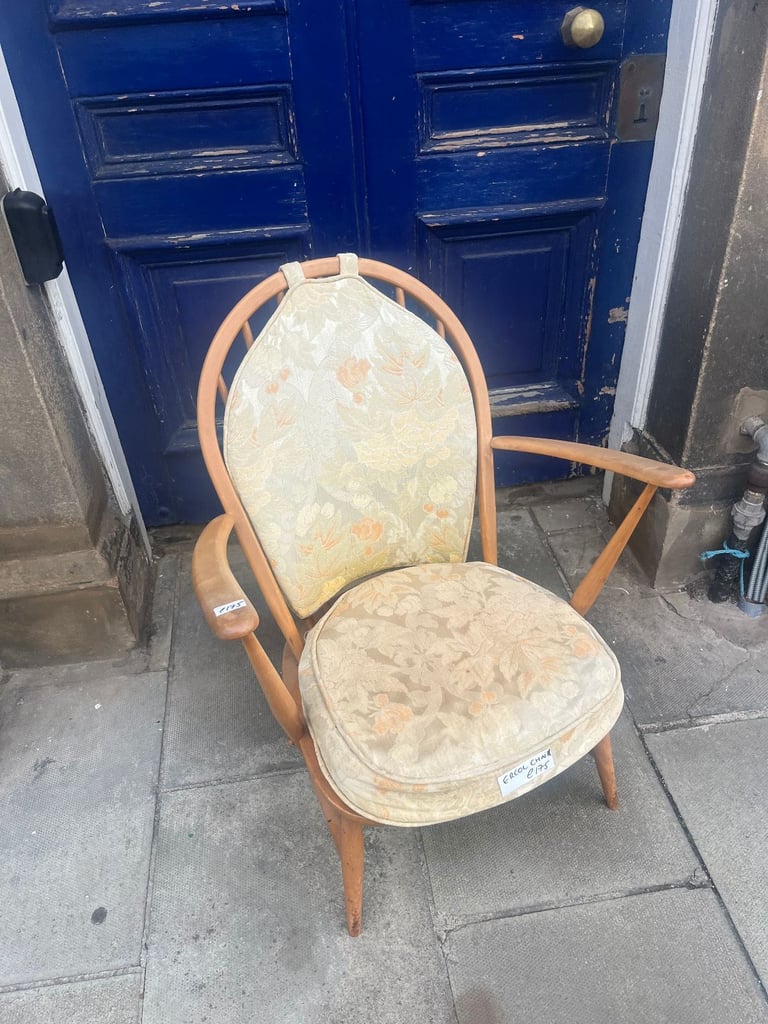 Ercol Wooden Chair ,cushions need reupholstered. But chair structural very good .  