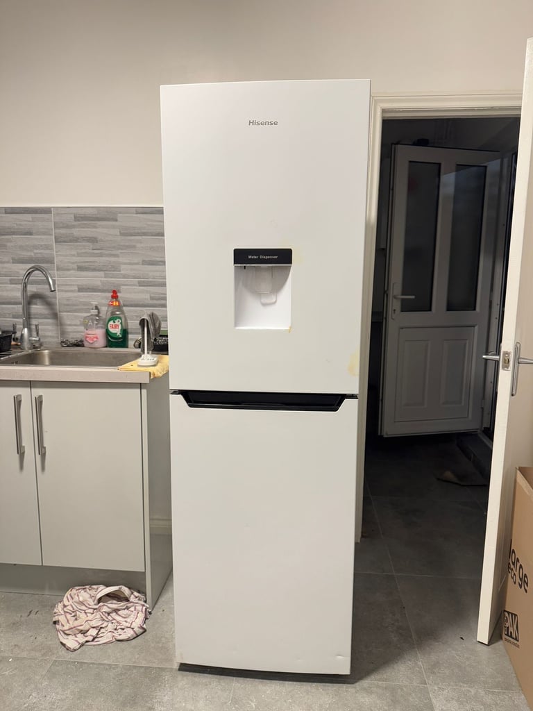Hisense fridge freezer with water dispenser.