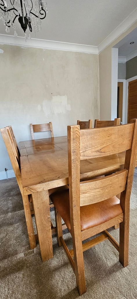 Oak dining table with six chairs and oak dresser