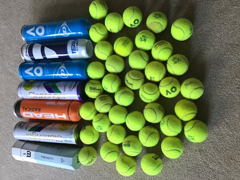 24 CANNED TENNIS BALLS IN GOOD CONDITION- POST OR COLLECT SURREY